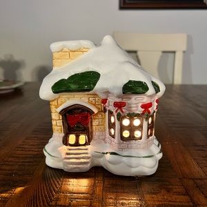 Yea for Christmas a cute cottage for your Christmas display.
